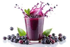 Juice splash with acai berries isolated on white background low angle photo