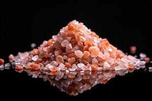 Macro photography of Himalayan salt isolated on black background with copy space Depth of Field photo