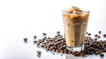 Macro shot of iced latte coffee in a glass with coffee beans isolated on white background photo