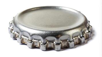 Macro shot of an empty gray bended crown cap on white background photo
