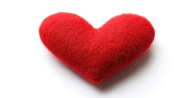 Macro red heart on white background photo