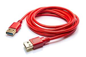 Red wire USB cable and adapter isolated on white background with selective focus and reflection photo