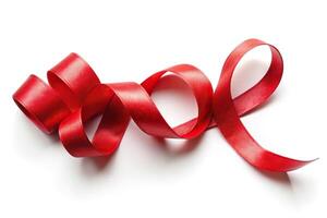 Red ribbon with curls isolated on white background photo