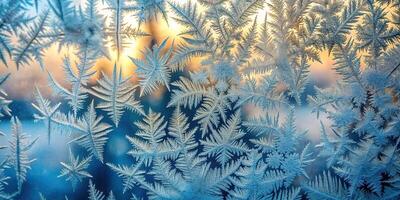 Panoramic frosty pattern on glass abstract background of ice frozen window photo