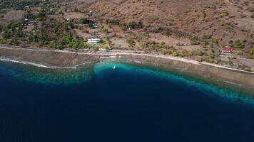 Landscape in West Bali with blue ocean reef in Pemuteran area, Aerial view video