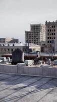 high vantage point, showing the rooftops of towering buildings at twilight video