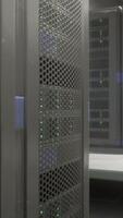 Shot of Corridor in Working Data Center Full of Rack Servers and Supercomputers video