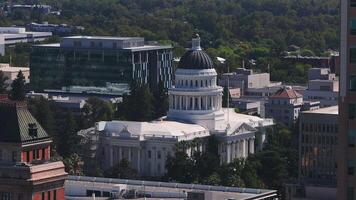 California State Capitol building on a sunny day in Sacramento. The California State Capitol stands as a historic edifice, combining neoclassical architecture with the functions of state government. video