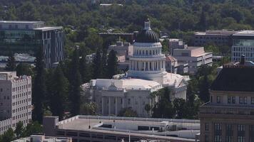 California State Capitol building on a sunny day in Sacramento. The California State Capitol stands as a historic edifice, combining neoclassical architecture with the functions of state government. video
