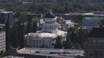 California State Capitol building on a sunny day in Sacramento. The California State Capitol stands as a historic edifice, combining neoclassical architecture with the functions of state government. video