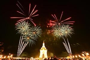 Colorful fireworks display on New Year's Day. This photo was taken in Sukhothai, Thailand on January 1, 2023.