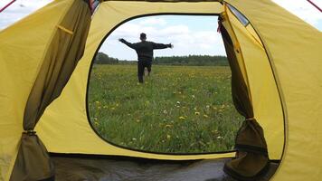concept of unity between man and nature during a camping trip into the wild video