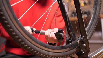 close-up of inflating a bicycle tire, wheel with a hand air pump video