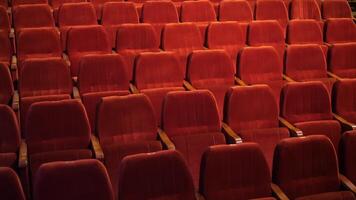 empty auditorium with orange chairs video
