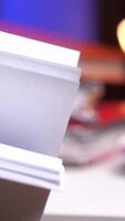 vertical leafing through a stack of documents. Finding required document video