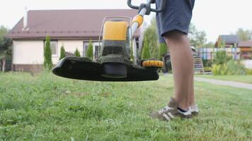 close-up of a working grass string trimmer video