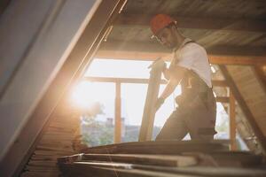 Process of construction new and modern modular house. Worker man in special protective uniform wear working on building development industry of energy efficient property. photo