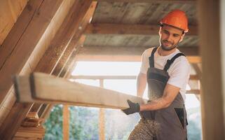 Process of construction new and modern modular house. Worker man in special protective uniform wear working on building development industry of energy efficient property. photo
