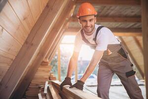 Process of construction new and modern modular house. Worker man in special protective uniform wear working on building development industry of energy efficient property. photo