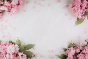 Sprigs of the sakura tree with flowers and petals on trendy marble background. Place for text. The concept of spring came. Top view. Flat lay photo