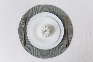 Thanksgiving set. Table setting, white plates with pumpkin, mockup photo