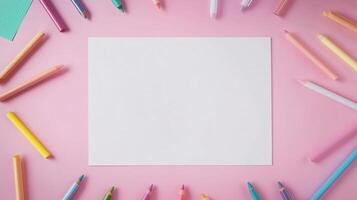 Blank white book and pencils coloring decoration for drawing or texting and pink background photo