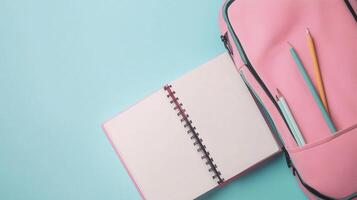 Blank white book open white school bag top of view copy space background photo