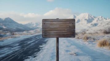 Wooden brown plank sign in winter road guiding direction of destination photo
