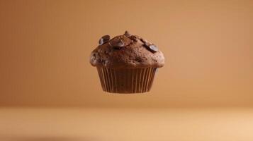 Chocolate muffin dark sweet cake flying solid background for background photo