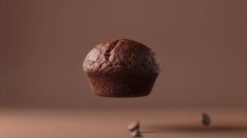 Chocolate muffin dark sweet cake flying solid background for background photo