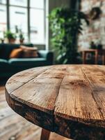 Rustic wooden table in a cozy living room with plants and sofa photo