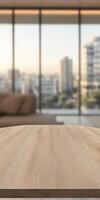 A sunlit urban apartment with a wooden table and city skyline view photo