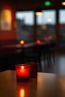 Cozy evening atmosphere in an empty restaurant with candlelit tables photo