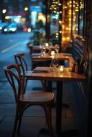 Cozy empty restaurant with warm lighting in an urban evening setting photo