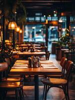 Empty cozy restaurant ready for diners in the evening light photo