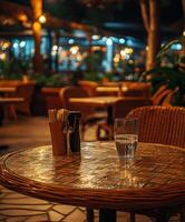 Cozy empty restaurant with warm lighting and inviting decor in the evening photo