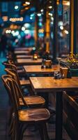 Cozy empty restaurant with inviting tables and warm lighting at dusk photo