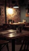 Cozy, empty restaurant with rustic decor and warm lighting at night photo
