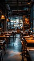 Cozy empty restaurant with warm lighting and inviting decor at dusk photo