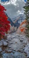 Majestic river valley with vibrant fall foliage and fresh snowfall photo
