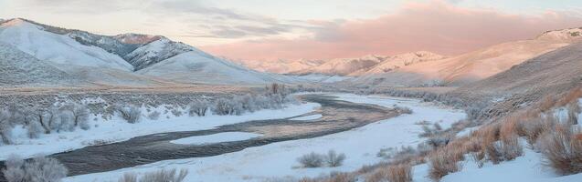 Majestic winter river valley in twilight with snow-covered hills photo
