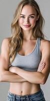 Young woman with a confident smile posing in casual attire photo