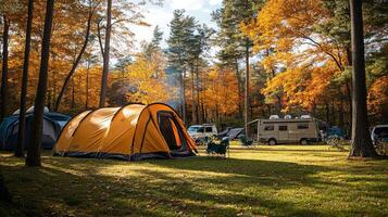Tourists camping with tent and camper van enjoying camping trip in the forest photo