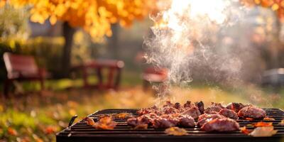 Indulge in a mouthwatering barbecue feast surrounded by the picturesque beauty of autumn foliage, featuring delectable grilled meats, vibrant and colorful leaves, all in a sunny outdoor environment photo