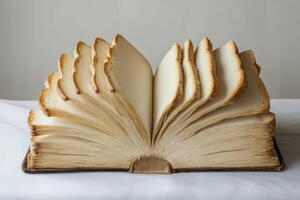 An intriguing image features a book made of fresh bread, symbolizing life, faith, and nourishment in a surreal kitchen, captivating the imagination and inviting reflection on deeper themes photo