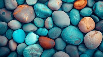 A vibrant collection of smooth pebbles in various colors and sizes, creating a beautiful natural background. photo