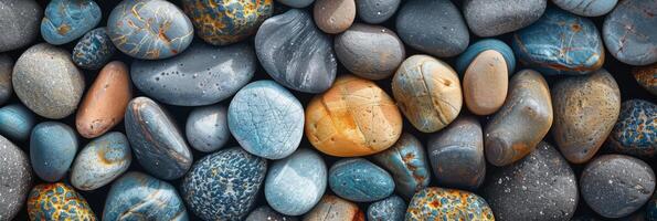 High-resolution photo of smooth, multicolored pebbles, perfect for natural and calming design projects.