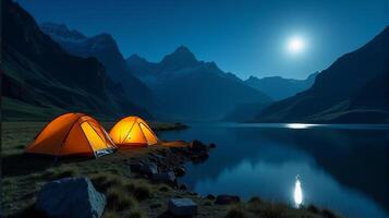 Serene Night-time Camping Scene in the Mountains. Clear Starry Sky With a Bright Full Moon Illuminating Landscape. photo