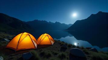 Serene Night-time Camping Scene in the Mountains. Clear Starry Sky With a Bright Full Moon Illuminating Landscape. photo