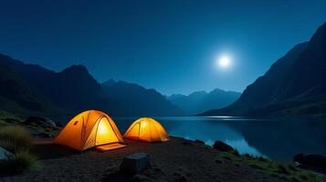 Serene Night-time Camping Scene in the Mountains. Clear Starry Sky With a Bright Full Moon Illuminating Landscape. photo
